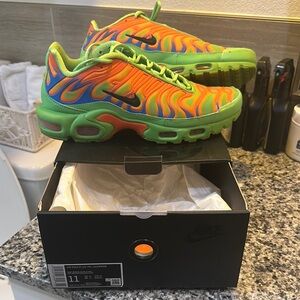 Supreme Orange and Green Sneakers with Bold Design